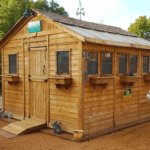 Cedar Sunshed 12 x 12 ft Western Red Cedar Garden Shed in Green with Workbench - Image 2