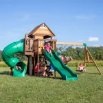 Backyard Discovery Cedar Cove Wooden Swing Set with Dual Slides, Rock Wall and Three Swings - Image 4