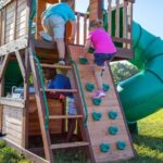 Backyard Discovery Cedar Cove Wooden Swing Set with Dual Slides, Rock Wall and Three Swings - Image 5