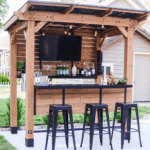Backyard Discovery Cedar Springs Outdoor Bar with Steel Top, Shelving and TV Privacy Wall