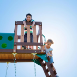Backyard Discovery Woodridge Elite Wooden Swing Set with Clubhouse and 10 ft Wave Slide - Image 3