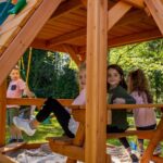 Gorilla Playsets Empire Extreme Cedar Wooden Swing Set with Monkey Bars, Clatter Bridge and 3 Slides - Image 6