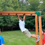 Gorilla Playsets Empire Extreme Cedar Wooden Swing Set with Monkey Bars, Clatter Bridge and 3 Slides - Image 7