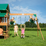 Canyon Creek All-Cedar Swing Set with Upper Fort, Rock Wall, Wave Slide, Web Swing & Play Kitchen - Image 3