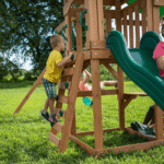 Canyon Creek All-Cedar Swing Set with Upper Fort, Rock Wall, Wave Slide, Web Swing & Play Kitchen - Image 6
