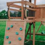Sterling Point Wooden Swing Set With Covered Clubhouse, Slide, Belt Swings and Rock Wall - Image 4