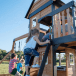 Canyon Creek All-Cedar Swing Set Playset with Rock Wall, Belt and Web Swings, Wave Slide and Play Kitchen - Image 4