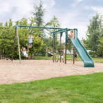 Lifetime Powder-Coated Steel Swing Set with 4 Swings, Trapeze Bar, Monkey Bars and 9 ft Wave Slide - Image 9